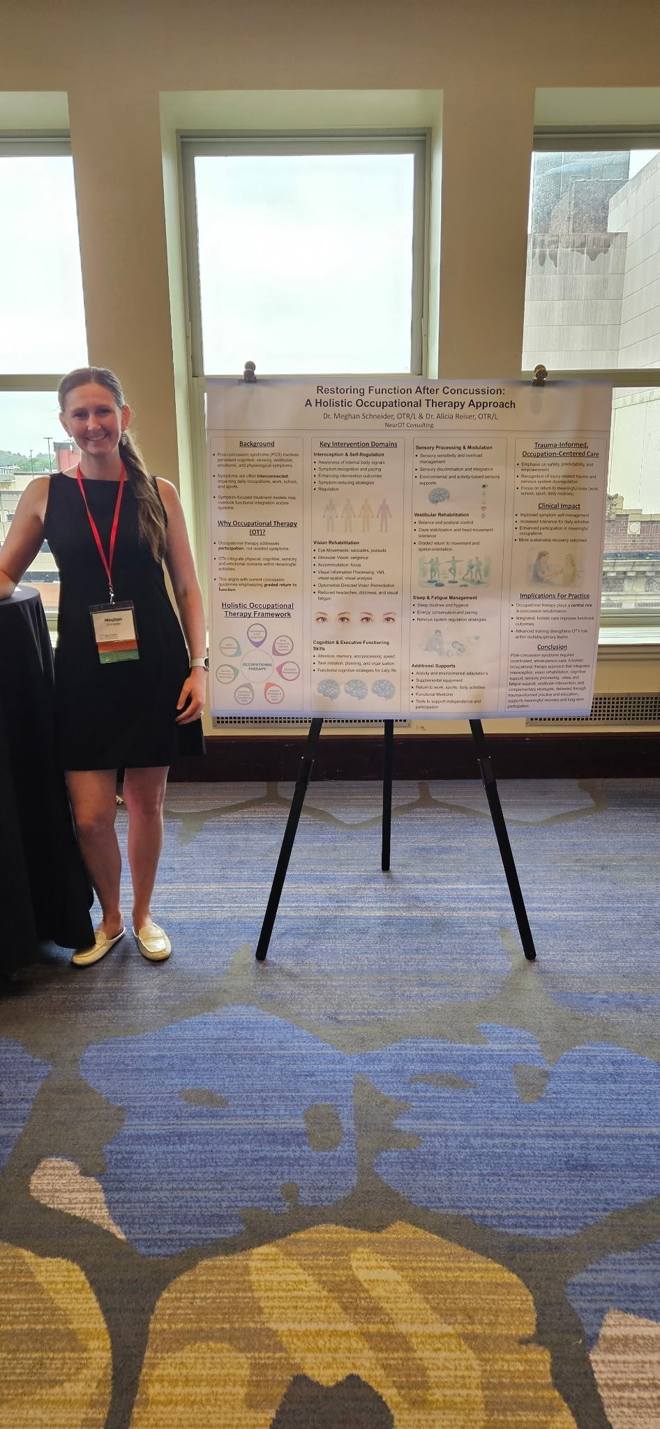 Meghan Schneider with her research poster, Restoring Function After Concussion, at the Pennsylvania Brain Injury Association Conference
